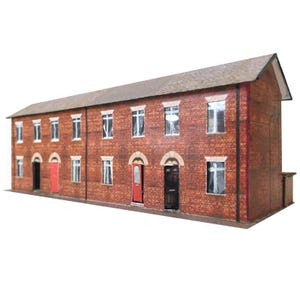 Puede incluir: Un modelo de papel de una casa adosada de ladrillo con puertas y ventanas rojas. La casa es un modelo en miniatura.