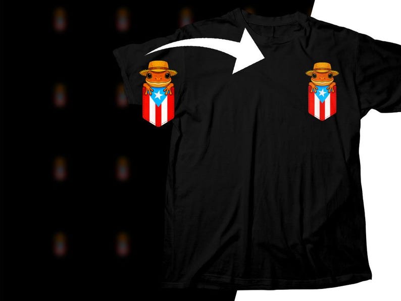 K&ouml;nnte beinhalten: Schwarzes T-Shirt mit einer Cartoon-Frosch, der einen Hut tr&auml;gt, in einer Tasche mit dem Design der puerto-ricanischen Flagge. Der Frosch ist orange und der Hut ist hellbraun. Das Flaggen-Design umfasst rote und wei&szlig;e Streifen, ein blaues Dreieck und einen wei&szlig;en Stern.