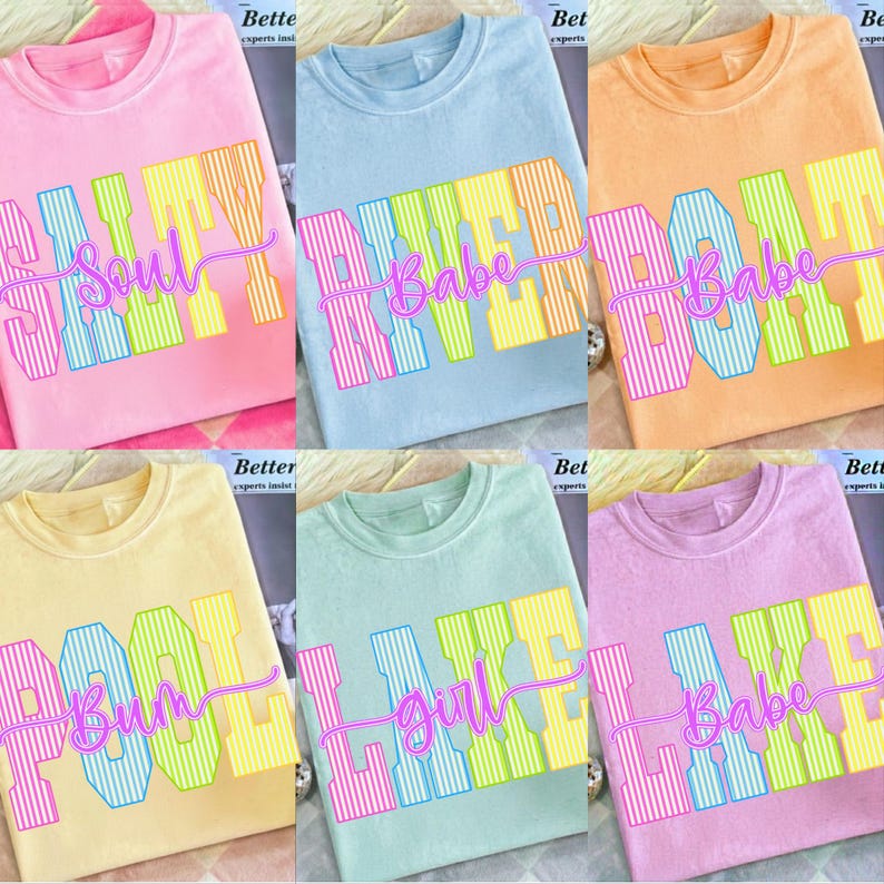 May include: Six pastel-colored t-shirts with various phrases in a bold, striped font. The phrases include "Salty Soul", "River Babe", "Pool Bum", "Lake Girl", and "Beach Babe". Each shirt has a different color, including pink, blue, orange, yellow, green, and purple.