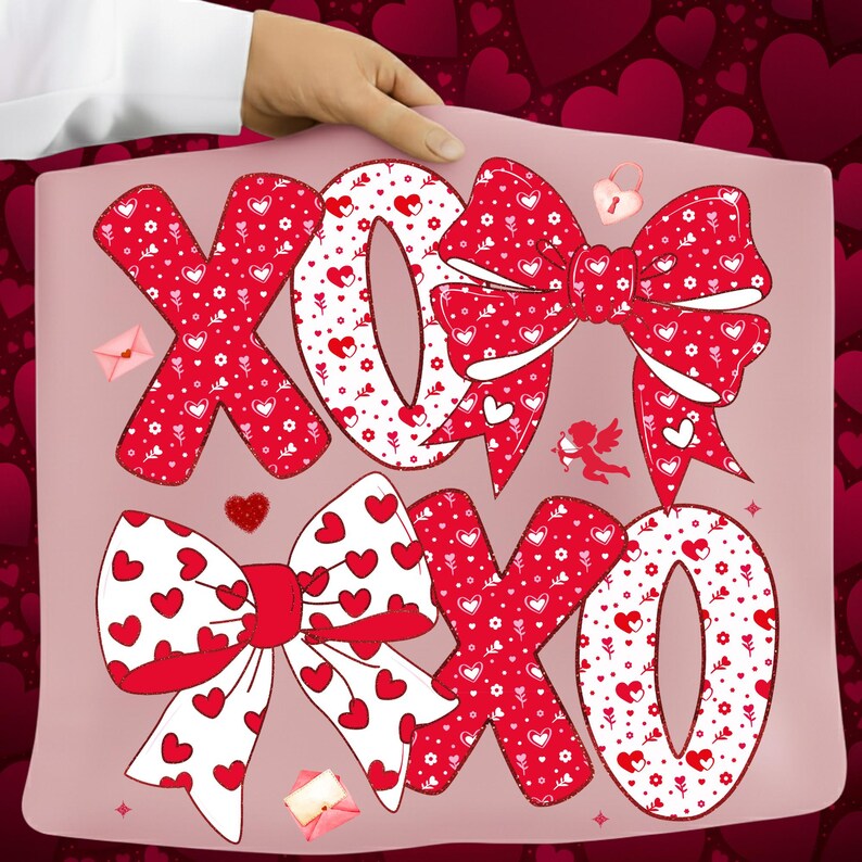 May include: A pink pillow with a Valentine's Day theme. The pillow features the letters "XOXO" in red and white, decorated with hearts and bows. A small Cupid, a lock, and envelopes are also included in the design.