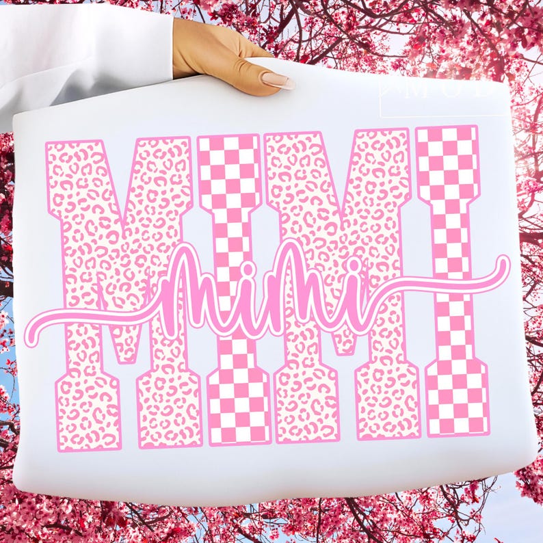 May include: A white sheet with the word "MIMI" in pink. The letters are a mix of leopard print and a pink and white checkerboard pattern. The word "Mimi" is written in a cursive font.