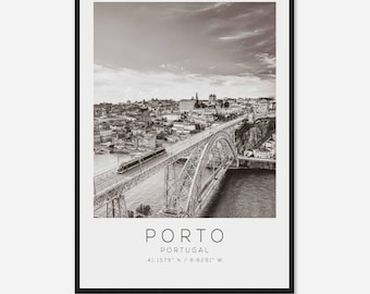May include: A black and white photograph of the Dom Luís I Bridge in Porto, Portugal. The bridge is a steel arch bridge that spans the Douro River. The city of Porto is visible in the background.
