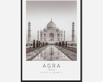 May include: A black and white photograph of the Taj Mahal in Agra, India. The text "AGRA INDIA 27.1767° N / 78.0081° E" is below the image.