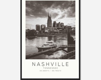 May include: Black and white print of the Nashville, Tennessee skyline, featuring the iconic AT&T building. A boat is docked on the river in the foreground. The print includes the city name, state, and coordinates.