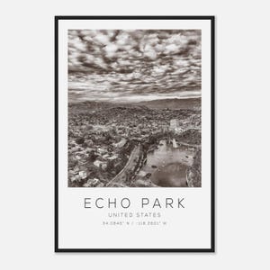 May include: Black and white photograph of Echo Park in the United States. The image shows a cityscape with a lake, buildings, and a cloudy sky. The text "Echo Park" and "United States" is printed at the bottom.