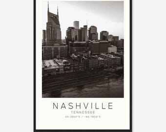 May include: Black and white framed print featuring the Nashville, Tennessee skyline. The print includes the city's name, state, and coordinates. The image showcases the city's architecture and buildings.