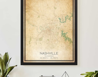 Może przedstawiać: Wizerunek mapy Nashville w stanie Tennessee w stylu vintage. Mapa jest wydrukowana na beżowym tle z brązowymi i zielonymi liniami. Tekst "Nashville, Tennessee 36.1669°N / -86.7852°E" jest wydrukowany na dole mapy.