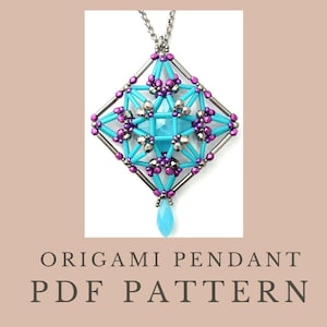 May include: A geometric pendant necklace with a square design. The pendant features turquoise and silver-colored beads and rods, with purple accents. A teardrop-shaped turquoise bead hangs from the bottom. The text "ORIGAMI PENDANT PDF PATTERN" is below the pendant.