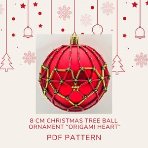 May include: Red and gold 8 cm Christmas tree ball ornament with an origami heart design.  PDF pattern.