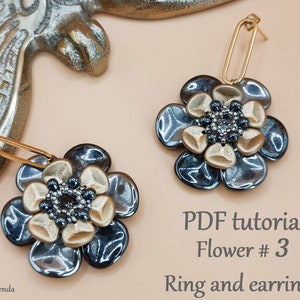May include: A pair of gold and black flower earrings with a PDF tutorial for a ring and earrings. The tutorial is titled "Flower # 3".