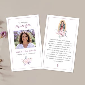 May include: A memorial card with a photo of Maria Luisa Garcia, with the dates 23 June 1975 - 15 August 2025. The card includes text in Spanish, a floral design, and an image of the Virgin of Guadalupe.
