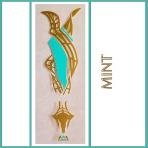 May include: Gold and turquoise blue decorative vinyl decal with the word "MINT" in gold lettering.