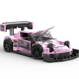 May include: A pink toy race car with black wheels and a large rear spoiler. The car has the word "HOONIGAN" on the spoiler and other areas. The car has the number "43" on the side and the "Mobil 1" logo.