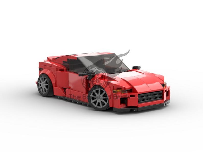 May include: A red toy car constructed from interlocking plastic bricks. The model features a sleek, aerodynamic design with black wheels and a detailed front grille. The car is a vibrant shade of red.