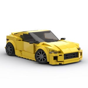 May include: A bright yellow toy sports car made of interlocking plastic bricks. The car has black wheels, a black windshield, and black side mirrors. The car's design is aerodynamic, with a low profile and sleek lines.