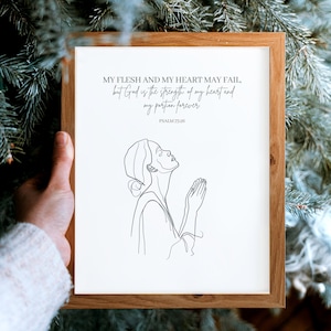 May include: A black and white line drawing of a person praying with the text "MY FLESH AND MY HEART MAY FAIL, but God is the strength of my heart and my portion forever PSALM 73:26"