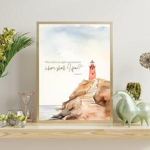 May include: Watercolor painting of a red lighthouse on a rocky cliff with a staircase leading up to it. The sky is blue and cloudy. The quote "The Lord is my light and salvation whom shall I fear?" is written in brown text with the verse "Psalm 27:1" below it.