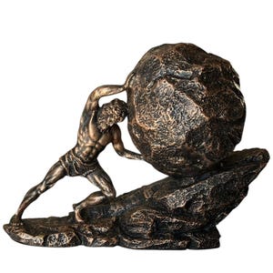 May include: Bronze-toned sculpture depicting a muscular figure straining to push a large, textured boulder. The figure is posed in a dynamic, athletic stance, with detailed musculature. The sculpture rests on a rocky base, creating a dramatic and powerful scene.