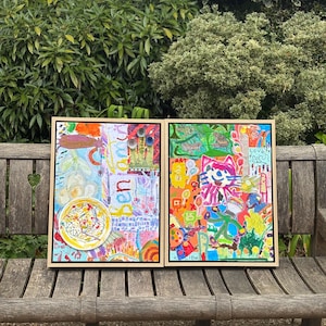 May include: Two rectangular framed artworks featuring vibrant, multi-colored mixed media collages. The left piece includes the name Benjamin in yellow text, while the right piece displays a pink cat illustration and the text Love from Samuel.