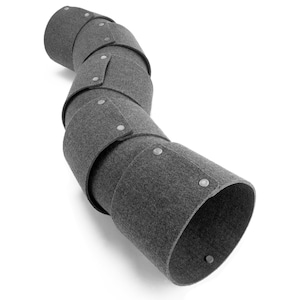 May include: A dark grey felt tunnel composed of multiple cylindrical segments connected by small silver-coloured metal snaps. The structure is curved and hollow, featuring a textured fabric surface throughout its entire length and open ends.