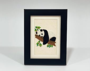 Art brodé à la main de panda endormi