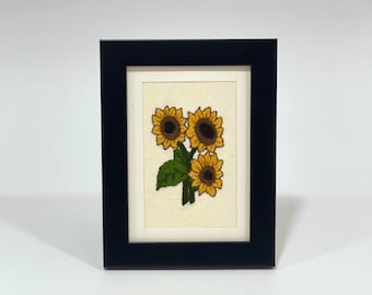 Broderie à la main de tournesols