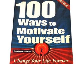 May include: A red, white, and blue book cover with the title "100 Ways to Motivate Yourself" and the subtitle "Change Your Life Forever". The book is by Steve Chandler, author of "Reinventing Yourself" and "50 Ways to Create Great Relationships".