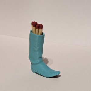 cowboy boot match holder striker