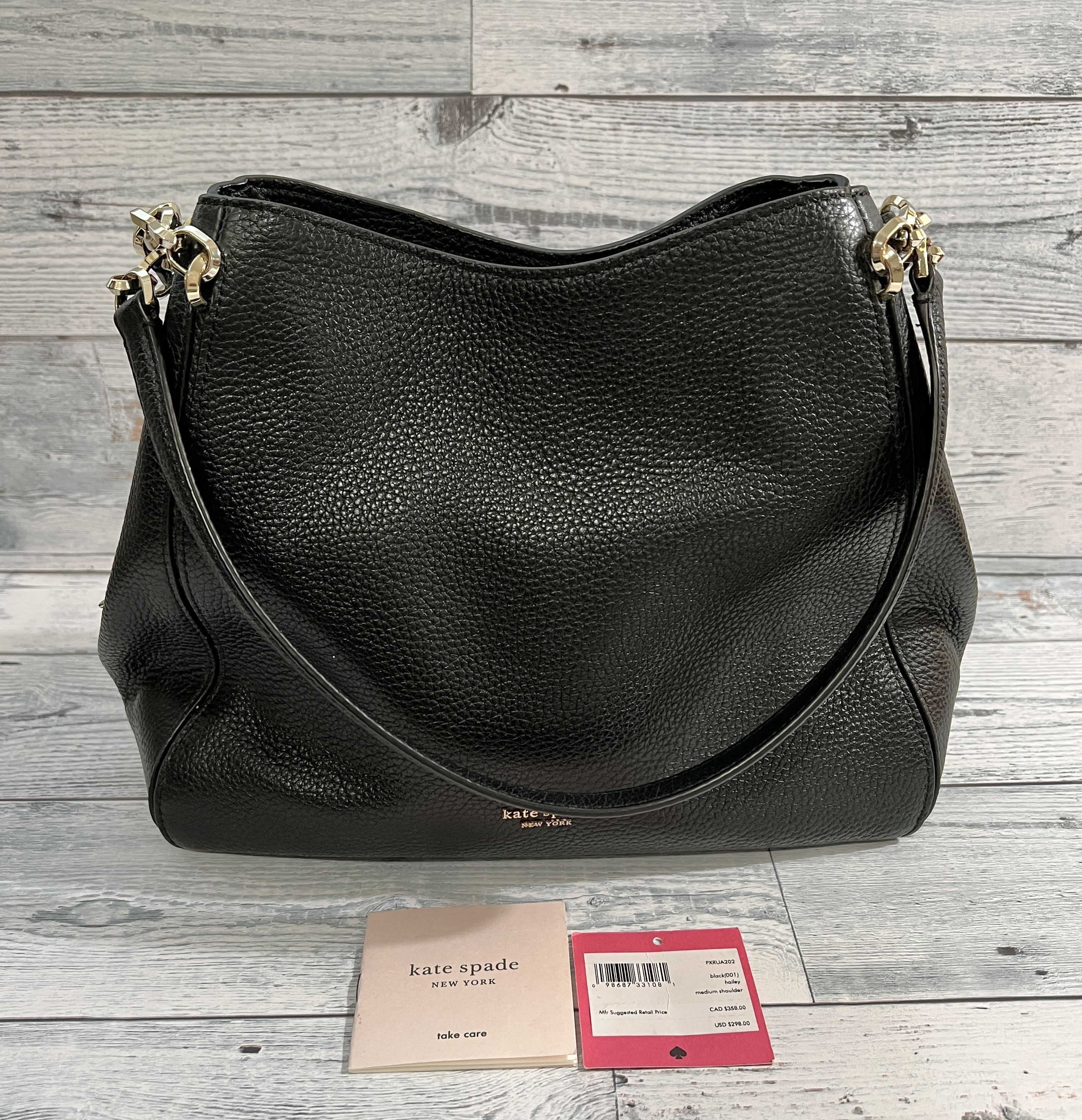 Medium black kate spade crossbody or shoulder handbag