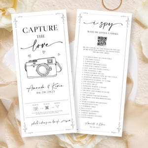 May include: Two white wedding cards with black text. One card says "Capture the Love" with a camera illustration and names and date. The other card says "i spy" with a list of wedding photo ideas.