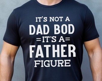 May include: Black t-shirt with white text that reads "It's not a Dad Bod = It's a Father Figure"
