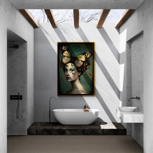 May include: A modern bathroom with a freestanding bathtub, a sink, and a framed print of a woman with a butterfly on her head. The bathroom has a concrete ceiling with wooden beams and a large window.