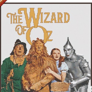 May include: Cross stitch pattern for a Wizard of Oz themed project. The pattern features the characters Dorothy, the Scarecrow, the Tin Man, and the Cowardly Lion. The title "The Wizard of Oz" is printed in gold letters on a white background.