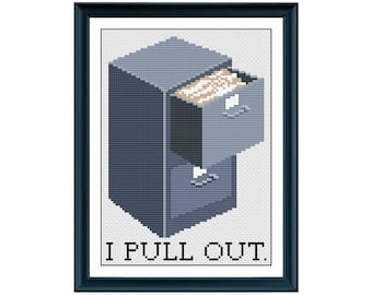 May include: A cross-stitch pattern of a file cabinet with a drawer pulled out, with the text "I PULL OUT." below it.