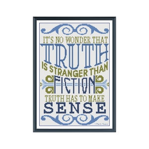 May include: A framed cross-stitch design with a white background and blue and green text. The text reads "It's no wonder that truth is stranger than fiction. Truth has to make sense." - Mark Twain.
