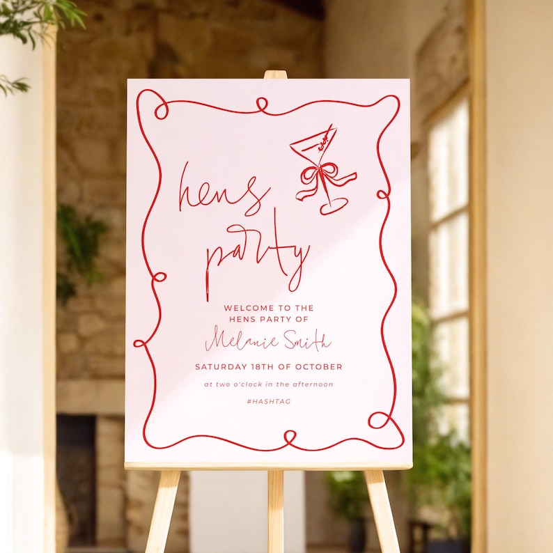 a sign with a red border and text inviting guests to a "Hens Party" on Saturday, 18th of October at two o'clock in the afternoon.