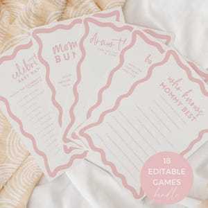 May include: A stack of white paper baby shower game cards with a wavy pink border. The cards feature printed text including "Celebrity Baby Names," "Mommy or Daddy," "Draw the Baby," and "Who Knows Mommy Best," with a pink circular badge stating "18 Editable Games Bundle."