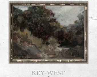 May include: A framed painting of a landscape scene with a river, trees, and a cloudy sky. The painting is in a dark brown frame with a gold trim. The painting is titled "KEY-WEST VINTAGE ART PRINTS".