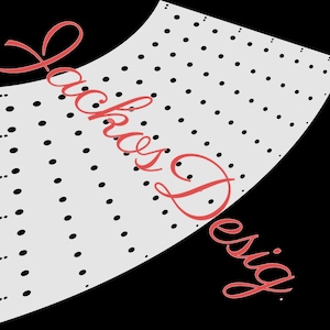 May include: A white fabric with a black polka dot pattern. The fabric is cut in a curved shape and has the text "Jackies Design" written in red cursive.