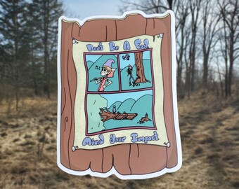 May include: A brown wooden sign with a white banner that reads "Don't Be A Fool, Mind Your Impact". The banner has a cartoon illustration of a person in a blue hat and pink shirt, a person in a blue hat and black shirt, and a bird on a broken branch.