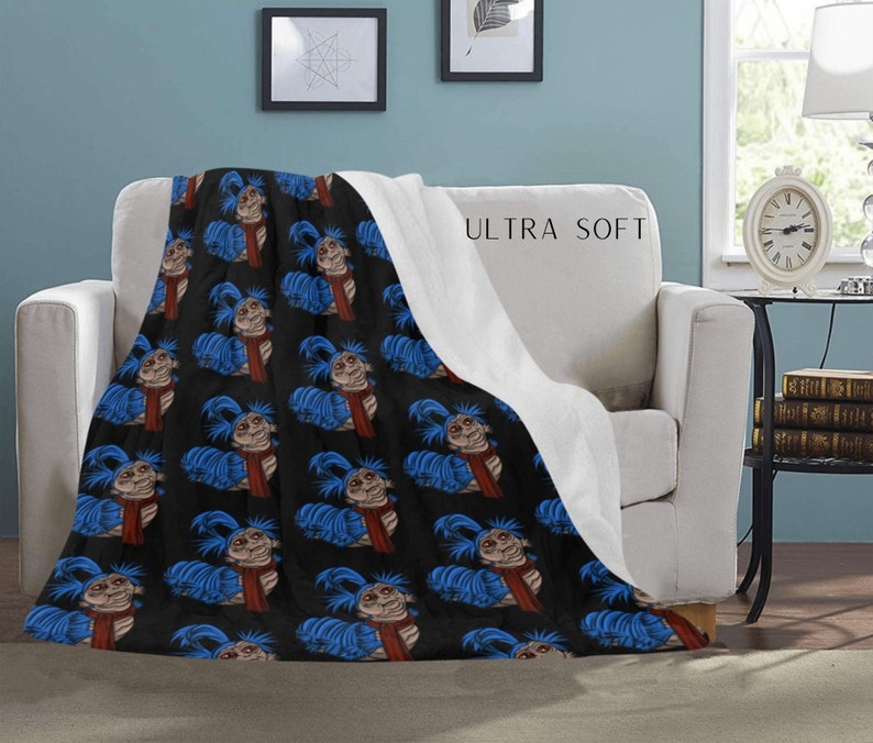60x50inch labyrinth worm printed throw blanket which is super soft and nice to wrap around yourself.