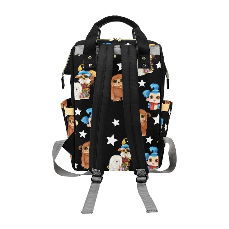 May include: Black backpack with a white star pattern and colorful cartoon characters. The backpack has adjustable straps and a zipper closure.