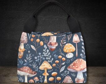May include: A blue tote bag with a mushroom and leaf pattern. The bag has black straps and a zipper closure.
