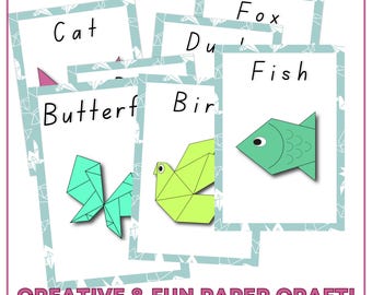 May include: A set of five origami animal cards with a blue and white background. The cards feature a cat, butterfly, bird, fish, and fox. The text "CREATIVE & FUN PAPER CRAFT!" is at the bottom of the image.