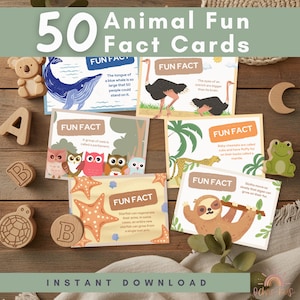 May include: A collection of 50 Animal Fun Fact Cards with illustrations and facts about various animals. The cards feature facts about whales, ostriches, owls, cheetahs, starfish, and sloths. Wooden animal-shaped toys and wooden letters are also present.