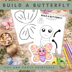 May include: A craft activity with the text "BUILD A BUTTERFLY" and "CUT AND PASTE PRINTABLE". The image shows butterfly cutouts, a finished butterfly sticker, and a partially assembled butterfly drawing. Other items include scissors, pencils, and decorative elements.