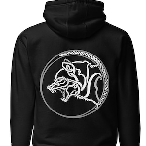 May include: Black hooded sweatshirt with a white graphic of a wolf's head in a circle on the back. The wolf's head is stylized with a Celtic knot design.