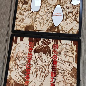 May include: Two framed wood-burned panels featuring manga artwork. The top panel shows characters with speech bubbles saying "DOMAIN EXPANSION!!!". The bottom panel displays characters with Japanese text. The frames are black.