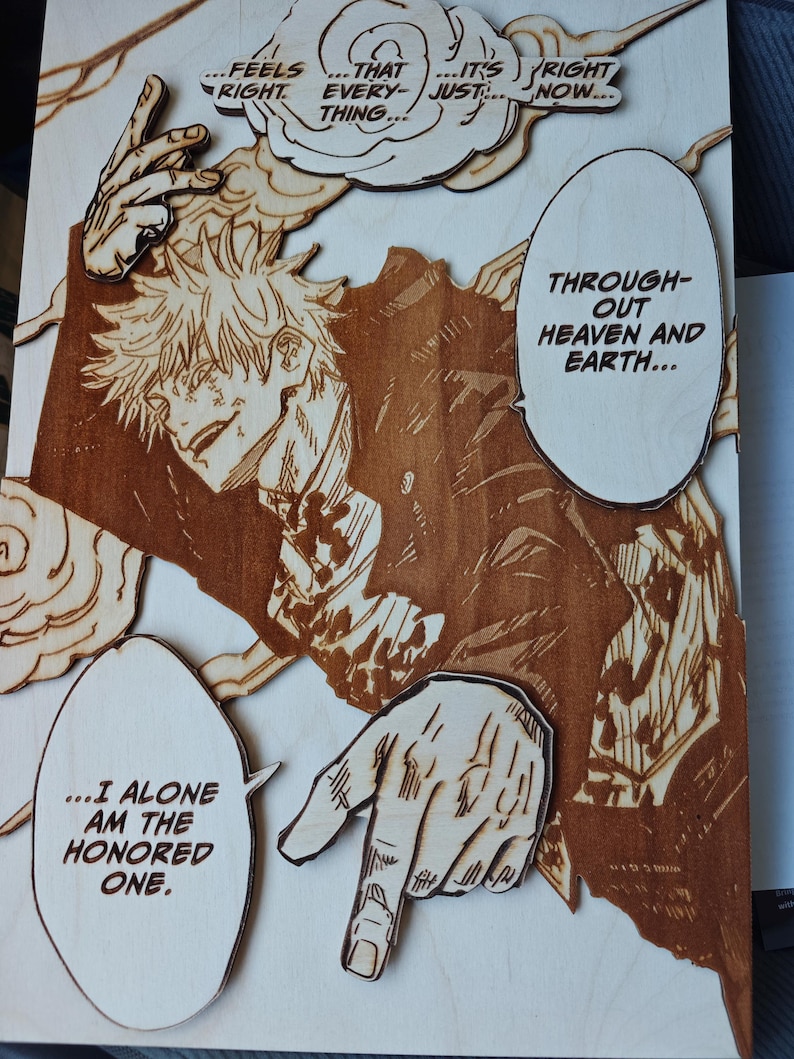 May include: Wooden artwork featuring a manga-style illustration of a character with spiky hair and speech bubbles. The artwork is in shades of brown and tan, with text that reads "...I ALONE AM THE HONORED ONE."