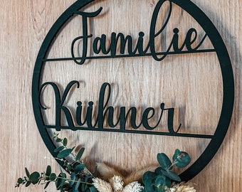 Wooden door wreath with dried flowers